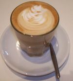 Drink a coffee at Cafe Kimbo de Napoli in Paris - fresh milk, delicious!